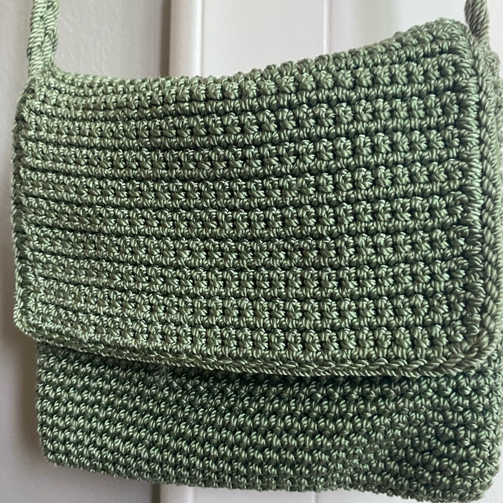 green woven cross body bag